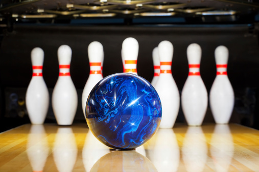 Organized pins at a bowling alley - sports and recreation concepts