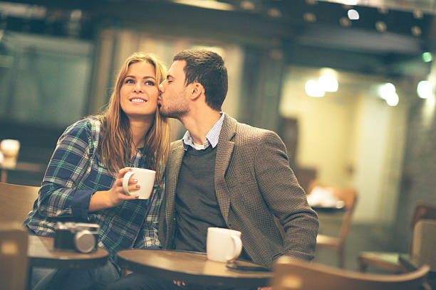istock Young couple in a coffee shop 469951639
