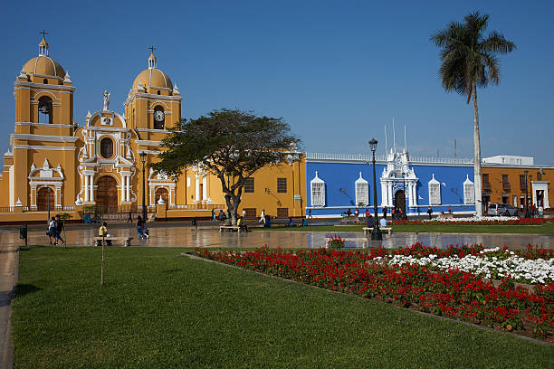Trujillo Trujillo, Peru - September 2, 2014: Colourfully painted Spanish colonial style buildings, including Trujillo Cathedral, in the Plaza de Armas of Trujillo in northern Peru. trujillo peru stock pictures, royalty-free photos & images