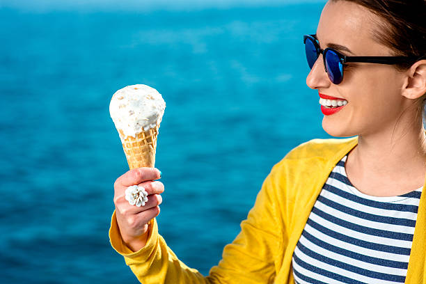 istock Woman with ice cream 469956332