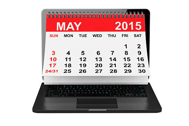 istock May 2015 calendar over laptop screen 469957110