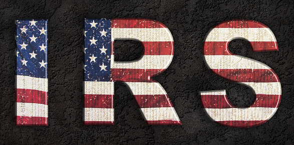 Illustration of the letters IRS. Represents the Internal revenue service wing of the United states of America that manages the federal income tax system. 