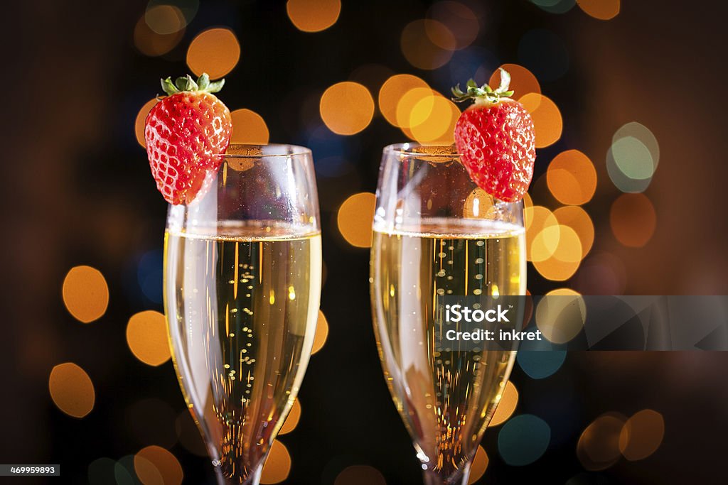 Glasses of champagne Two glasses of champagne with strawberries. Champagne Stock Photo