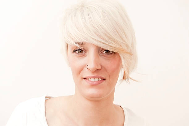istock Beautiful woman with short white hair 469960105