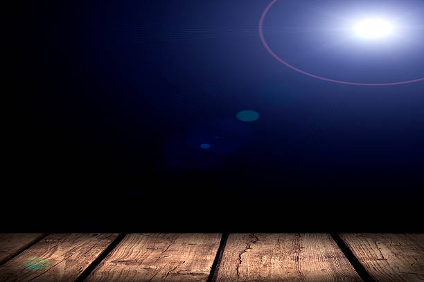 istock Light on wooden floor in empty room 469962148