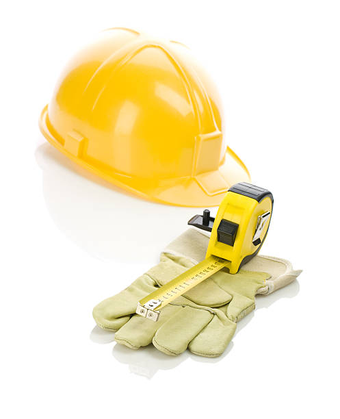 istock glove with tapeline and helmet 469962304