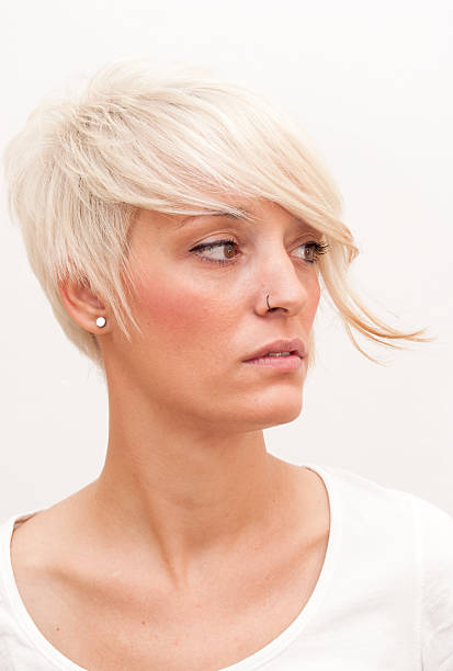 istock Beautiful woman with short white hair 469962499