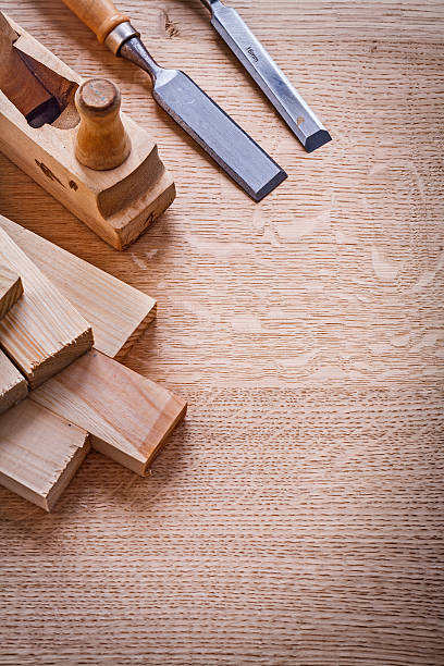 istock copyspace image stack of wooden planks chisels woodworkers plane 469962648
