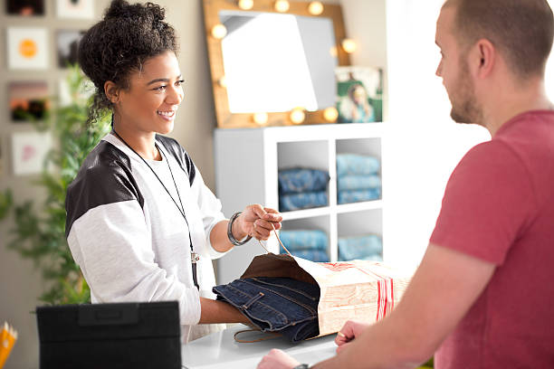 istock Clothes shop sales assistant 469963791