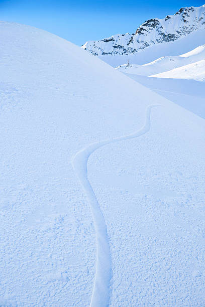 istock Fresh snow on the top of Alps Mountains 469963895