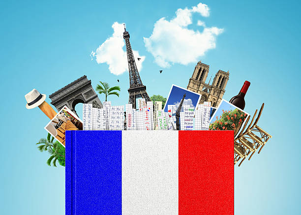A French flag language book with French themed items at top French language, the book with the French flag and bookmarks experiential travel stock pictures, royalty-free photos & images