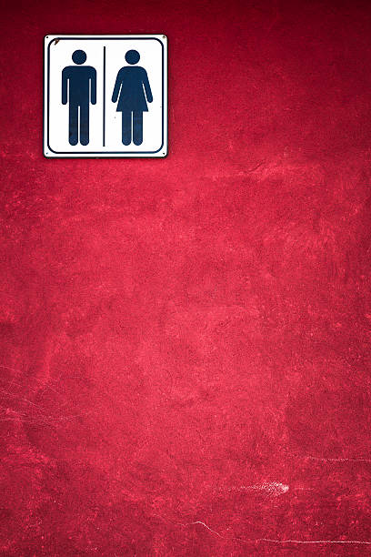 homme femme symbole - sign dirty plaster red photos et images de collection