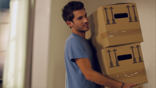 Couple moving in to new apartment