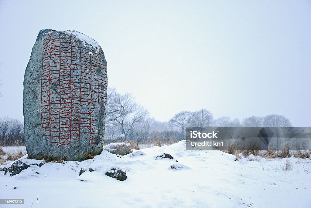 Rune stone in winter land Rune stone in swedish winter landscape. This rune stone is located in Karlevi at the island Oland in Sweden. The Swedish island Oland, the island of sun and wind, is located in the Baltic Sea just off the coast of mainland Sweden. The nature and landscapes of Oland is unique with a special light and a wide range of different nature types. Runes Stock Photo