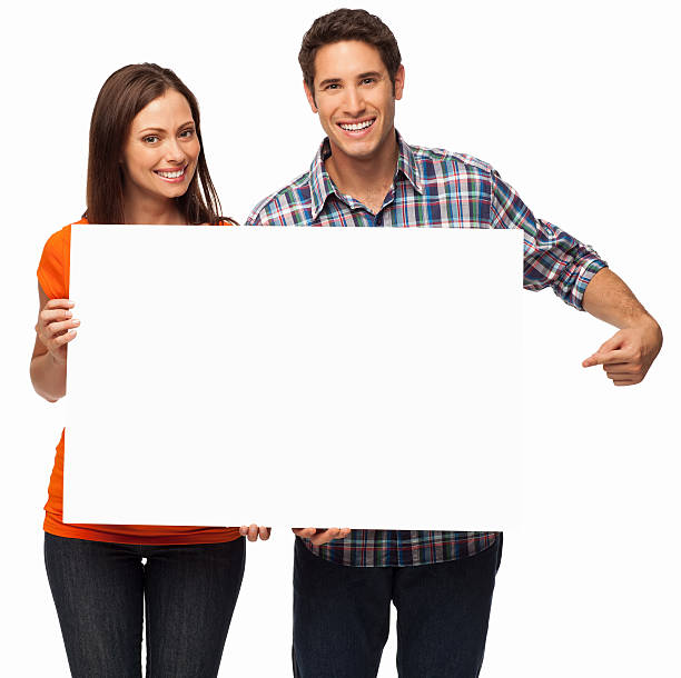 istock Couple Holding Blank Sign - Isolated 469974379