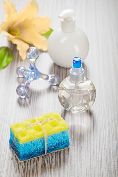 istock massager sponge soap flower and bottles 469975078