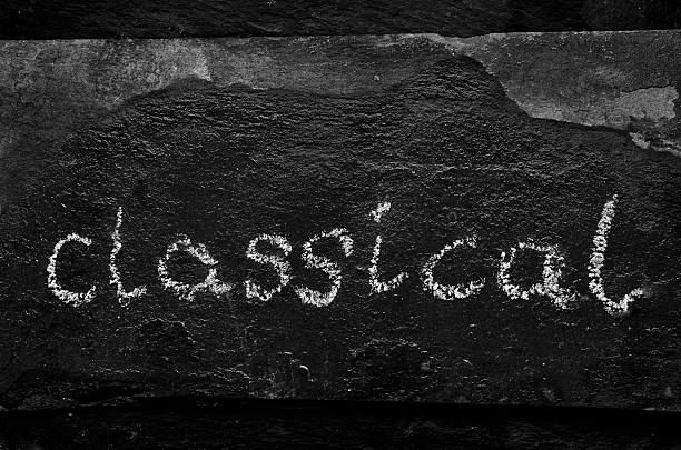 istock The word CLASSICAL written with chalk on black stone. 469975166