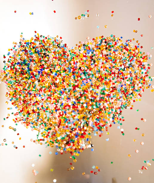 istock Illuminated colorful  heart shaped glass beads. 469978271