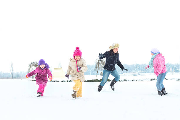 istock Happy family enjoying in winter 469979493