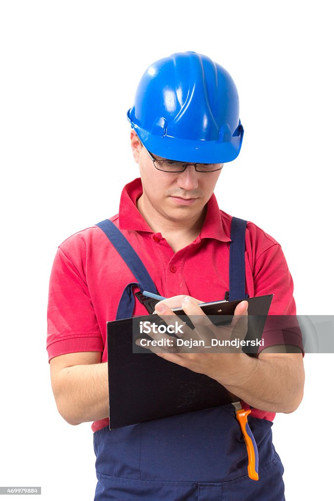 Worker isolated on white background Young caucasian worker with working tools 2015 Stock Photo
