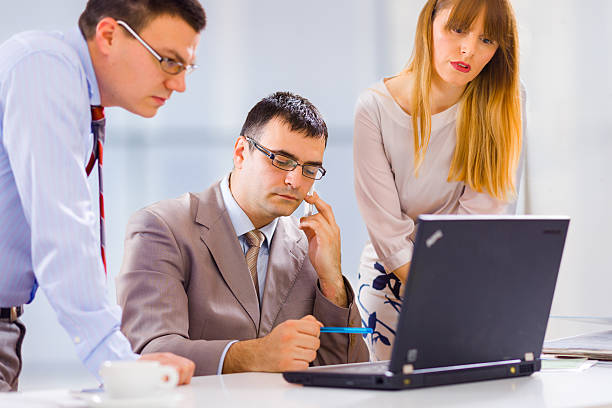 istock Businesspeople working together in office 469981064
