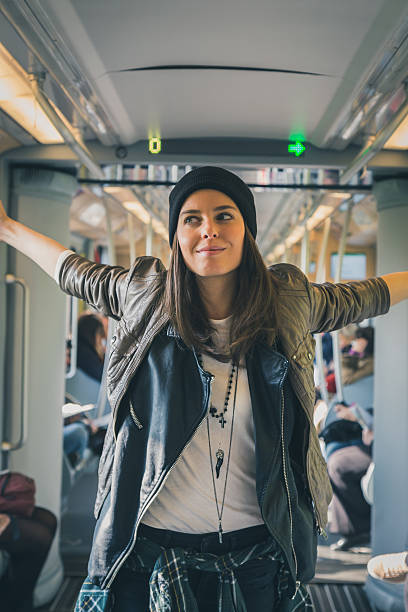istock Pretty girl posing in a metro car 469981418