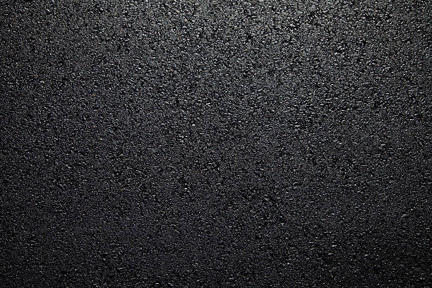 Fresh asphalt background Background of freshly put asphalt on road. black tar stock pictures, royalty-free photos & images