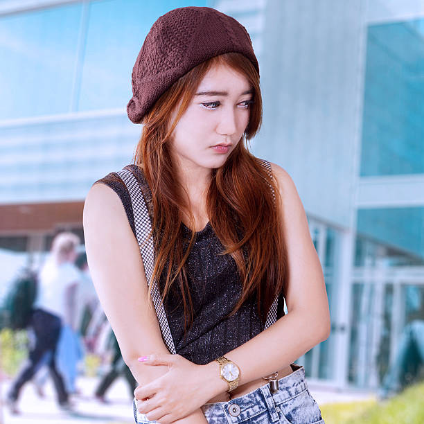 istock Sad female student at school 469981540