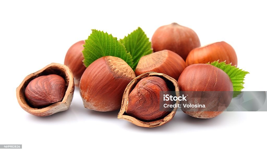 Filbert nuts with leaf Filbert nuts with leaf on white background Hazelnut Stock Photo