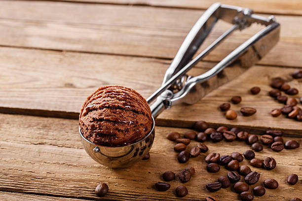 istock Chocolate coffee ice cream ball scoop spoon 469983418