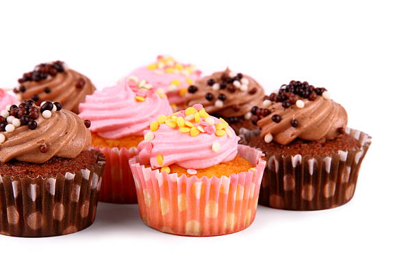 istock Chocolate and pink cup cakes with deco balls 469984685