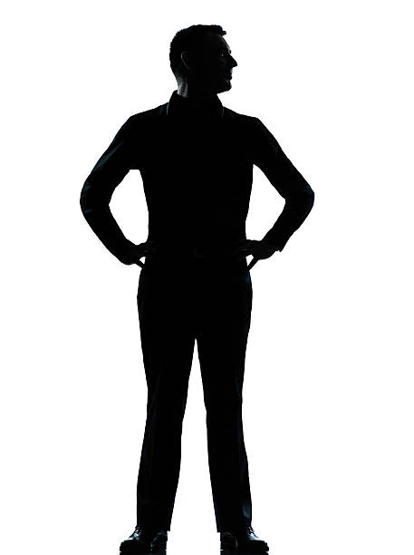 istock one business man standing hands on hips silhouette 469986095