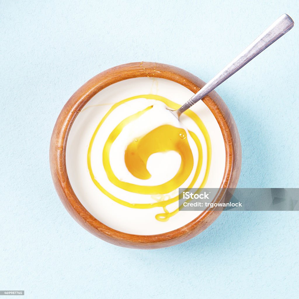 Yogurt and honey A bowl of greek yogurt with honey Yogurt Stock Photo
