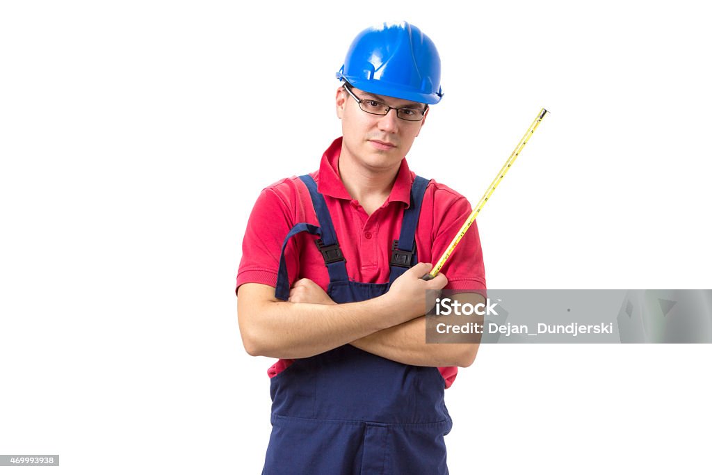 Worker isolated on white background Young caucasian worker with working tools 2015 Stock Photo