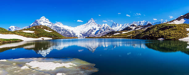 bachalpsee reflections - switzerland european alps schreckhorn horizontal photos et images de collection