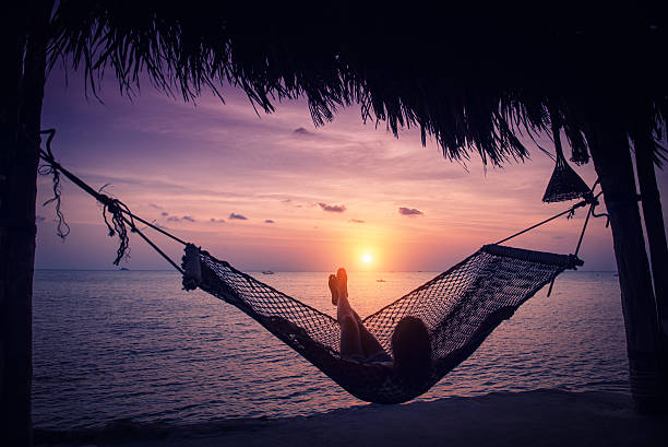 istock Beautiful woman enjoying sunset 469998437