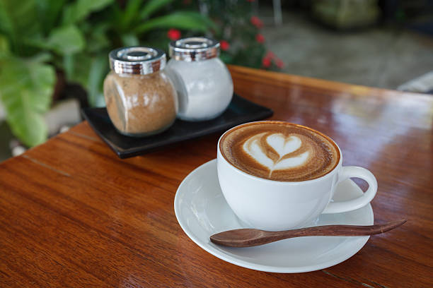 istock Cup of latte coffee on wooden 469998580