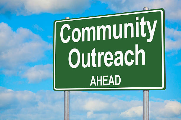istock Community Outreach Ahead Highway Sign 470001699
