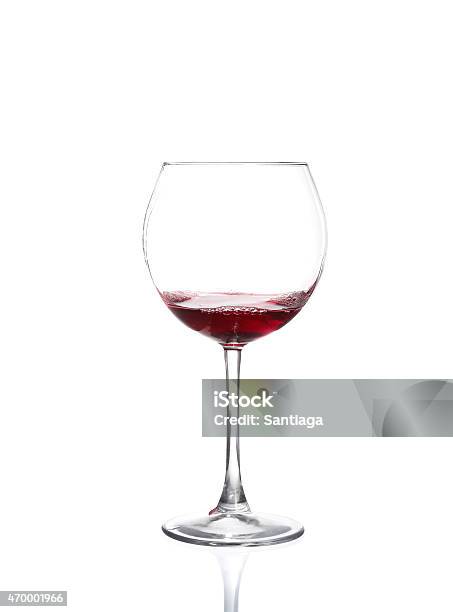 Red Wine Pouring From Bottle Into Big Glass Stock Photo - Download Image Now - 2015, Cabernet Sauvignon Grape, Close-up
