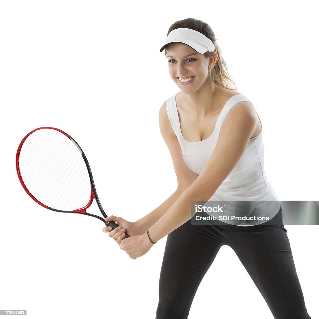 Athletic Giocatore di tennis giocando il gioco; Fotografia da studio - Foto stock royalty-free di Ambientazione interna