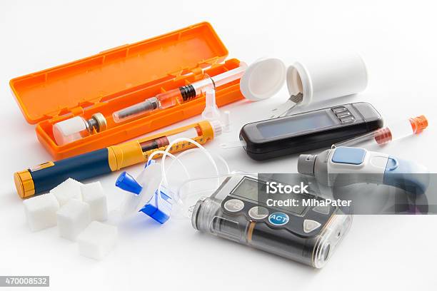 Closeup Of Items Needed To Control Diabetes Stock Photo - Download Image Now - Insulin pump, Insulin, Pen