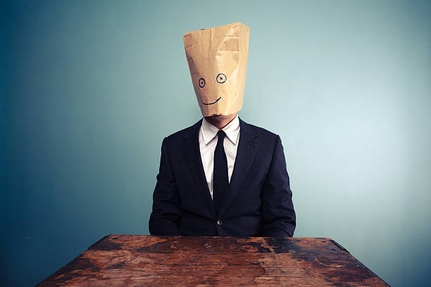 istock Businessman with bag over head 470009091