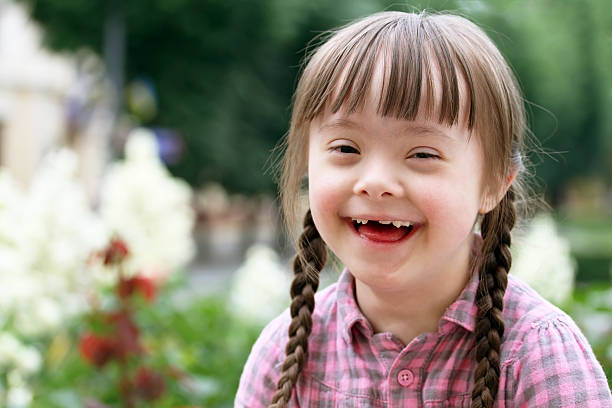 Portrait of girl smiling Portrait of beautiful young girl smiling disability photos stock pictures, royalty-free photos & images
