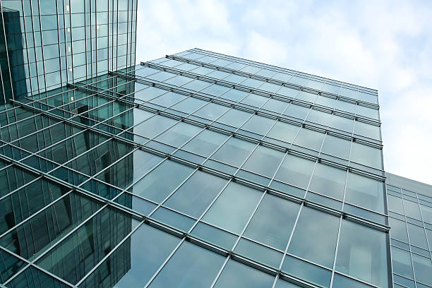 istock blue glass wall of modern building 470010087