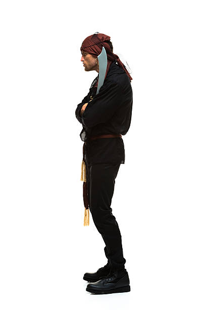 istock Side view of pirate standing with sword 470010365