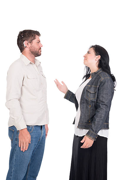 istock young deaf  and hearing impaired couple or siblings signing 470011379