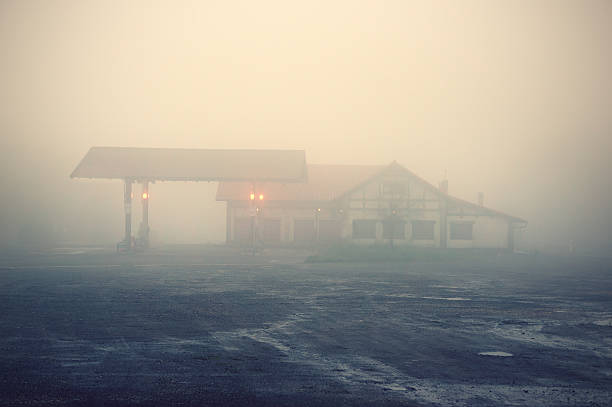 old gas station on countryside with a hotel