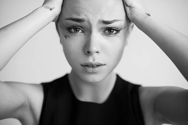 istock The woman with running mascara 470013680