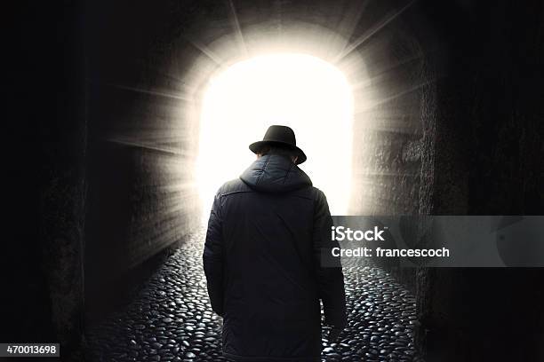 Old Man Getting Out From Dark Stock Photo - Download Image Now - Men, Walking, Dark