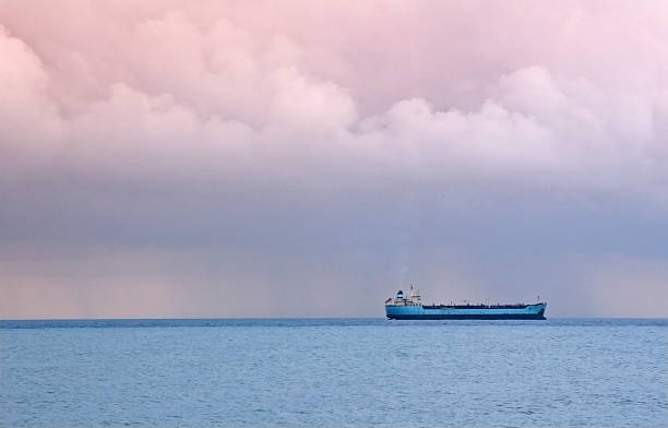 istock Cargo ocean liner in sea with storm 470020342
